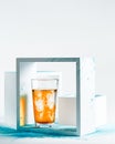 Pint Glass with Colored Liquid in a Geometric Environment