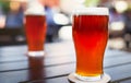 Pint glass of craft beer on table Royalty Free Stock Photo