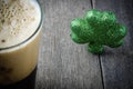 Pint of Stout Beer with Green Shamrock Royalty Free Stock Photo
