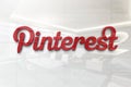Pinterest on glossy office wall realistic texture
