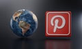 Pinterest Logo Beside Earth 3D Rendering. Top Apps Concept