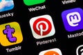 Pinterest mobile icon app on a screen smartphone iPhone. Pinterest is a social internet service, photo hosting