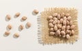 Pinto Bean legume. Close up of grains spreaded over white table. Royalty Free Stock Photo