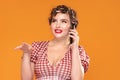 Pinup beautiful girl talking by mobile phone Royalty Free Stock Photo