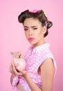 Pinup girl with fashion hair. pretty girl in vintage style. pin up woman with trendy makeup. loan. Money. Housewife Royalty Free Stock Photo