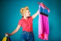 Pinup girl with shopping bags buying clothes dress Royalty Free Stock Photo
