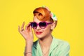 Pinup girl woman holding heart shaped sunglasses Royalty Free Stock Photo