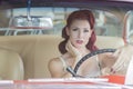 WWII Pinup Model And Muscle Car Royalty Free Stock Photo