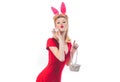 Pinup woman bunny Easter. Lovely woman in rabbit costume. Happy woman preparing for Easter with Easter egg.