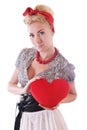 Pinup woman holding plush heart Royalty Free Stock Photo