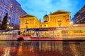 Pioneer Courthouse with tram trail on a rainy winter night