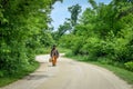 Pioneer Man with Beard Walking Down Road