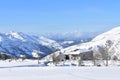 Winter landscape with snowy mountains, shelter and valley with blue sky. Piornedo village, Ancares, Lugo, Galicia, Spain. Royalty Free Stock Photo