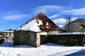 Piornedo, Ancares, Lugo Province, Galicia, Spain. Ancient snowy palloza house made with stone and straw. Mountain village.