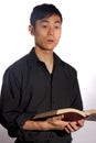 A pious Asian man