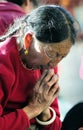 Pious tibet prayer in jokhang temple