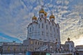 Piously-Troitsk cathedral on a decline in clouds. Magadan. Winter Royalty Free Stock Photo