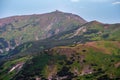 Pip Ivan mount and observatory and rhododendron flowers on slope