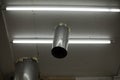 Pipe in ceiling. Pipe comes out of roof inside. Steel profile