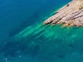 The pipe drains the sewer into the sea. Environmental pollution. Drone view Royalty Free Stock Photo