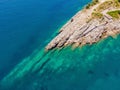 The pipe drains the sewer into the sea. Environmental pollution. Drone view Royalty Free Stock Photo