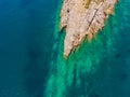 The pipe drains the sewer into the sea. Environmental pollution. Drone view Royalty Free Stock Photo