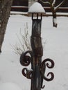 Pipe of an old cast-iron wood-burning village stove