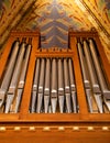 Pipe organ frontal shot, shiny silver prospect pipes pattern, row closeup. Sacral music, church musical service and Royalty Free Stock Photo