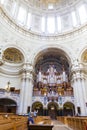The pipe organ and tourists visiting the Berlin Dome