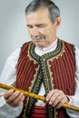 Pipe player in traditional clothing