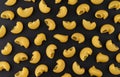 Pipe rigate pasta pattern on black background, top view, flat lay texture Royalty Free Stock Photo