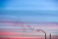 Pipe of smog in a beautiful sunset Royalty Free Stock Photo
