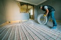 Pipefitter installing system of heating Royalty Free Stock Photo