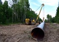 Pipelayer with side boom Installation of gas and crude oil pipes in ground. Construction Natural Gas Pipeline Project