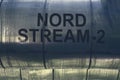 Pipeline with the inscription NORD STREAM - 2 Royalty Free Stock Photo