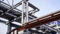 Pipeline system in an industrial enterprise, background Royalty Free Stock Photo