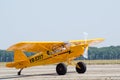 Piper Cub yellow airplane on airshow
