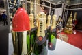 Piper Heidsieck champagne logo on bottles on display in a shop.