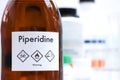 Piperidine in glass, chemical in the laboratory and industry Royalty Free Stock Photo