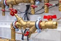 Pipes and faucet valves of heating system in a boiler room Royalty Free Stock Photo