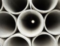 Pipes at the hardware store used for the construction. Close up concrete, cement pipes stacking, pattern background. Asbestos pipe Royalty Free Stock Photo