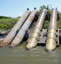 pipes of the powerful water pump to suck the water to avoid flooding OR to irrigate the cultivated fields Royalty Free Stock Photo