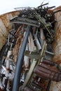 Pipes and tubes, ferrous scrap iron in a container Royalty Free Stock Photo