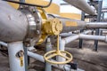 Pipes, tubes, machinery and steam turbine at a power plant Royalty Free Stock Photo