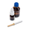 Pipette and bottle with medicines.
