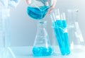 Young Asian scientist with test tube making research in clinical laboratory.Science, chemistry, technology, biology and people con Royalty Free Stock Photo