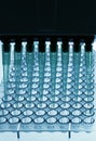 Pipetting samples in a plate Royalty Free Stock Photo