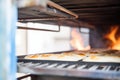 piping hot loaves bread directly from the industrial oven