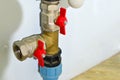 Piping and plumbing fitting in the home industry of the modern era. Connecting pipe warm water floor to the manifold heating.
