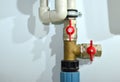 Piping and plumbing fitting in the home industry of the modern era. Connecting pipe warm water floor to the manifold heating.